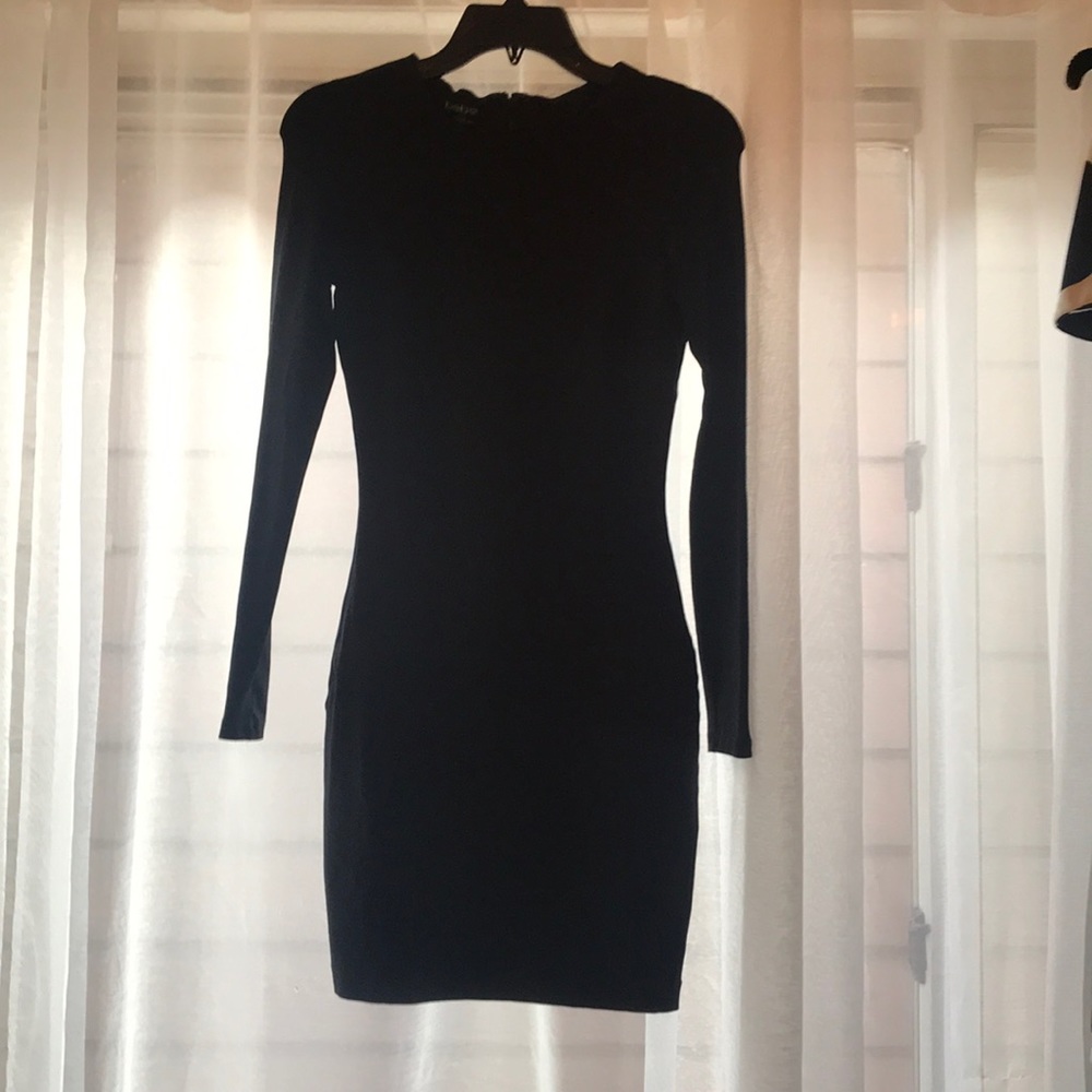 Black dress with long sleeves. Women XS